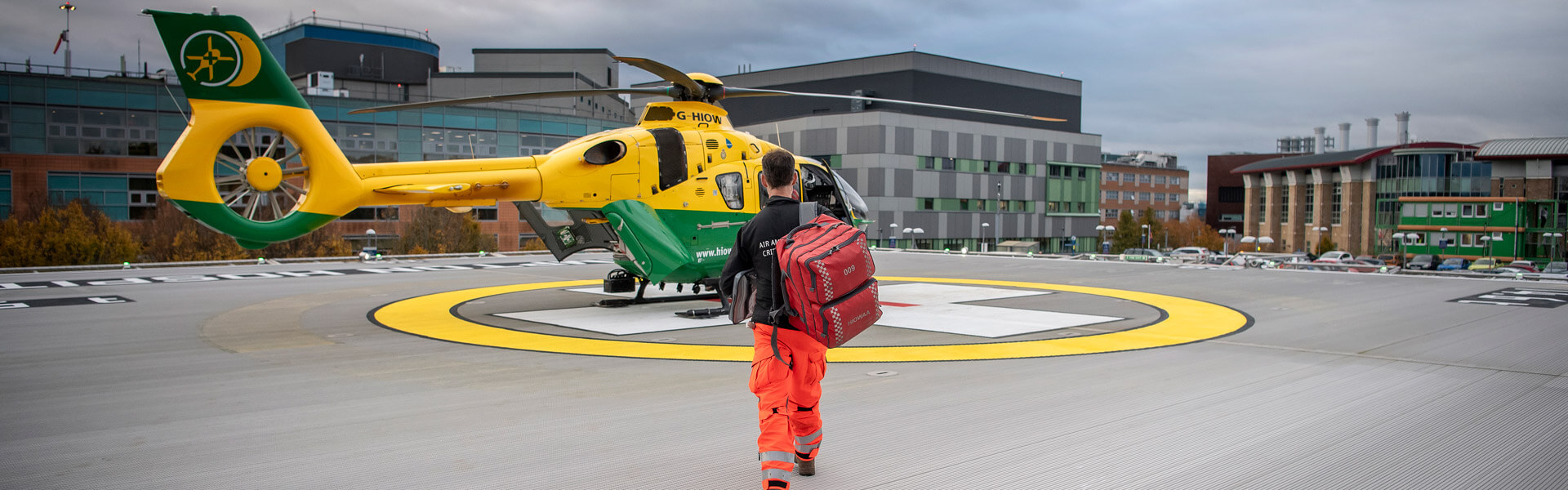_ABT3015 Hampshire Air Ambulance crew walking to Helicopter