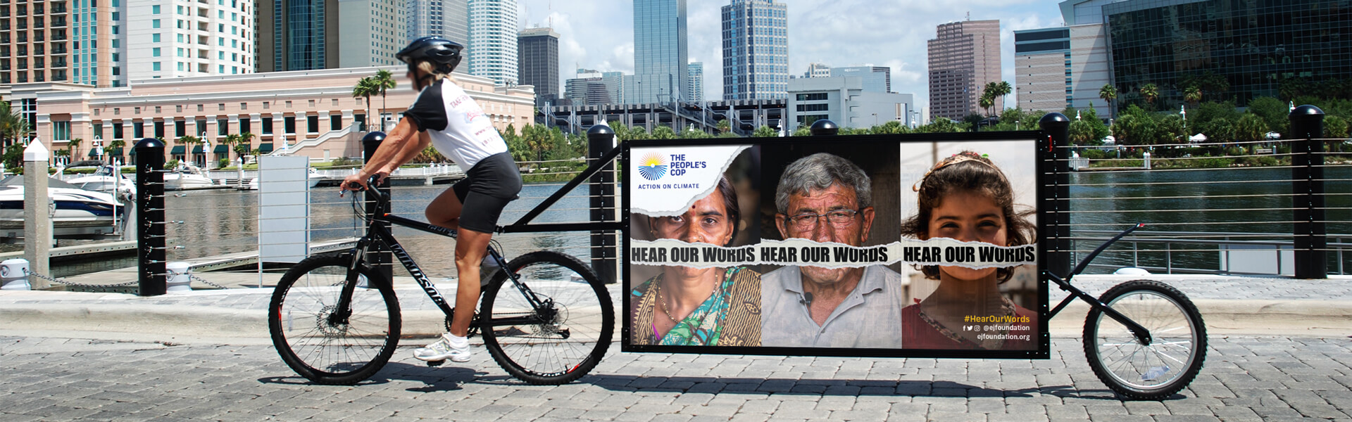 COP-bike-example The Peoples COP advertising campaign 'Hear our words' on the back of a bike